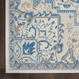 Nourison Elation 5'3" x 7'3" Polyester Bohemian Indoor Rug in Ivory Blue