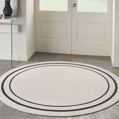 Nourison Essentials Indoor/Outdoor Solid Bordered Ivory/Black 6' x Round Area Rug, Easy Cleaning, Non Shedding, Bed Room, Living Room, Dining Room, Backyard, Deck, Patio (6 Round)