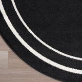 Nourison Essentials Indoor/Outdoor Solid Bordered Black Ivory 6' x Round Area Rug, Easy Cleaning, Non Shedding, Bed Room, Living Room, Dining Room, Backyard, Deck, Patio (6 Round)