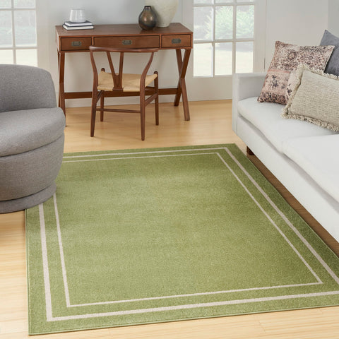 Nourison Essentials Indoor/Outdoor Solid Bordered Green Ivory 5' x 7' Area Rug, Easy Cleaning, Non Shedding, Bed Room, Living Room, Dining Room, Backyard, Deck, Patio (5x7)