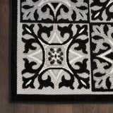 Nourison Aloha 42x66 Modern Fabric Rug in Black White Finish