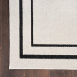 Nourison Essentials 3' x 5' Ivory/Black Contemporary Indoor/Outdoor Rug